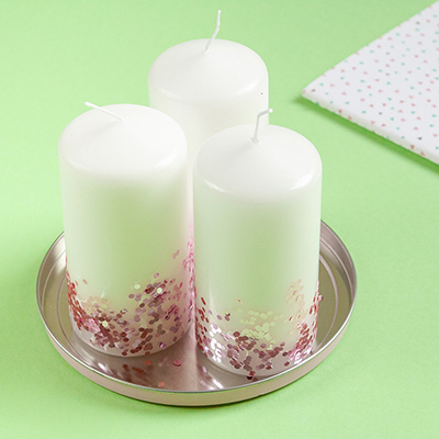How to Make Glitter Candles - Learn how to make simple glitter candles in this DIY! - www.yeswemadethis.com