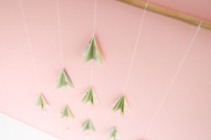 Space Saving Christmas Tree - DIY - Made of paper and thread, this beautiful Christmas tree is perfect for small spaces - www.yeswemadethis.com