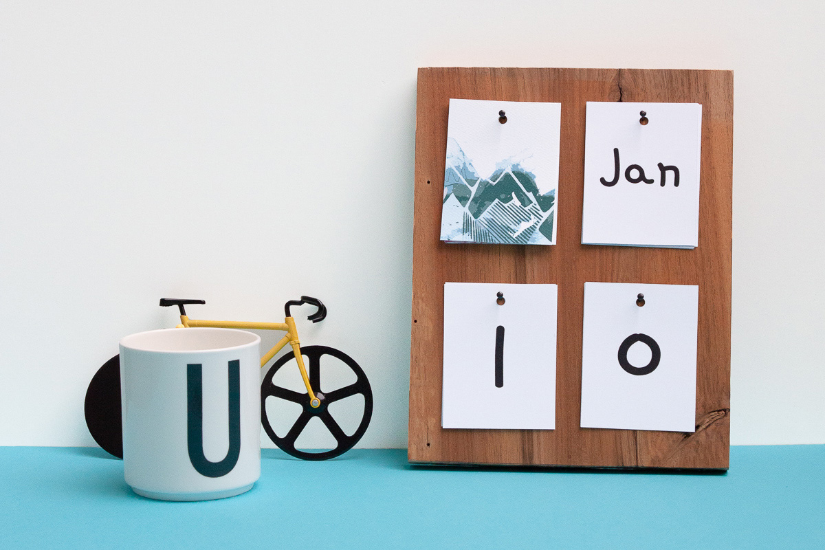 DIY Desk Calendar + a Free Printable - Make your own calendar this year with our free printable! - www.yeswemadethis.com
