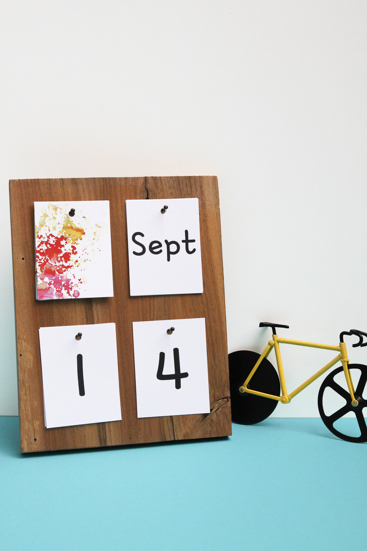 DIY Desk Calendar + a Free Printable - Make your own calendar this year with our free printable! - www.yeswemadethis.com
