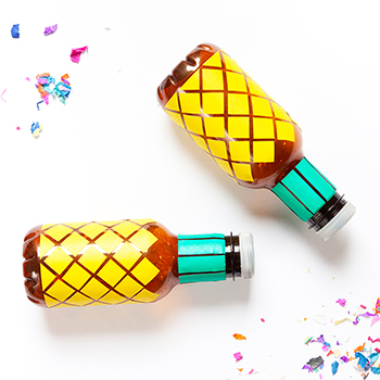 DIY Pineapple Maracas - Learn how to make these fun maracas out of plastic bottles. - www.yeswemadethis.com